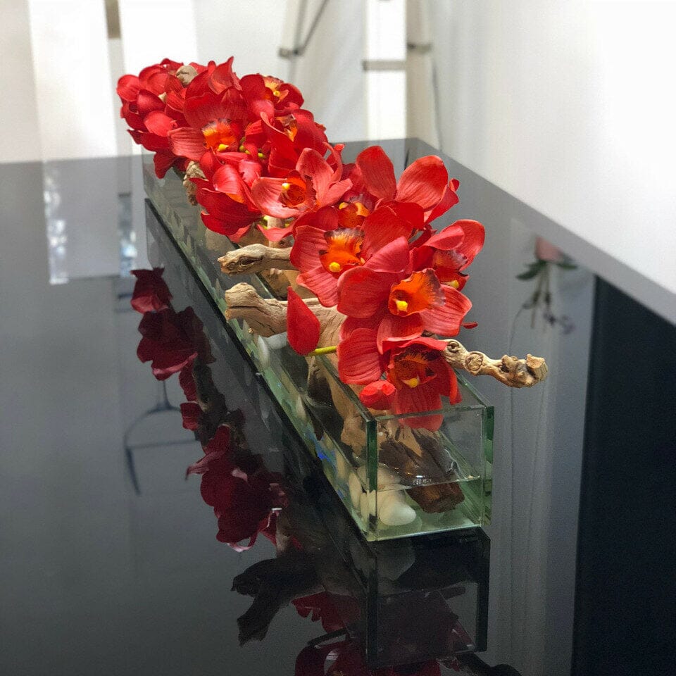 Maceta de vidrio Modern House de 122 cm con cymbidiums rojos